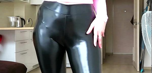  Sexy horny blonde walks around the room in tight leggings